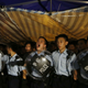 Police officers shout as they instruct the protesters to move to a nearby park at the main roads outside government headquarters in Hong Kong